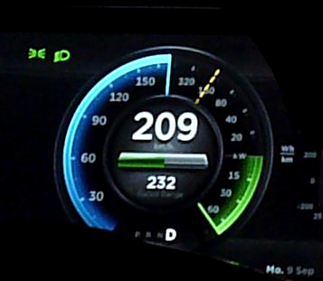 A Tesla Model S P85+ using regenerative braking power in excess of 60 kW. During regenerative braking the power indicator is green.
